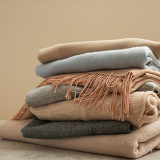 Woollen & Synthetic Cloths Importe